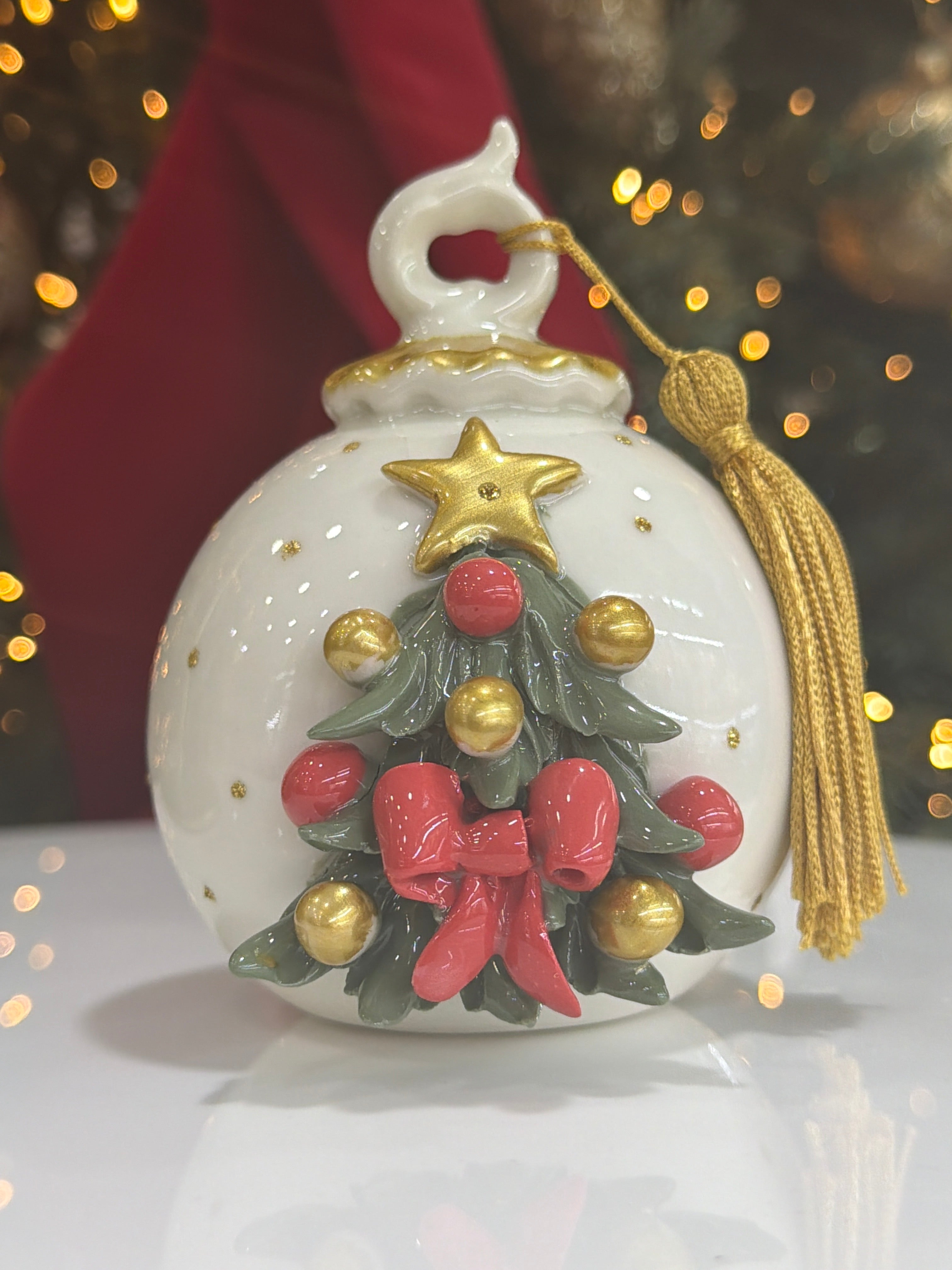 PALLA AVORIO 9*12H CON ALBERO PALLINE ORO FIOCCO ROSSO